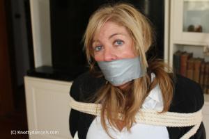 www.knottydamsels.com - Dakkota Grey Businesswoman Tape Gagged Photo Set thumbnail