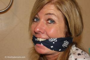 www.knottydamsels.com - Dakkota Grey Photoset: Fun With Gags Part 1: Blue Bandana Cleave thumbnail